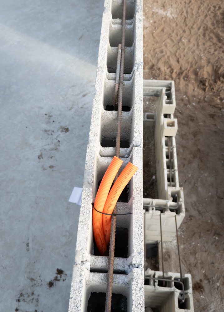 Hernando Bond Beam Prep Image of bond beam prep - conduit inside the walls before the lintel is poured
